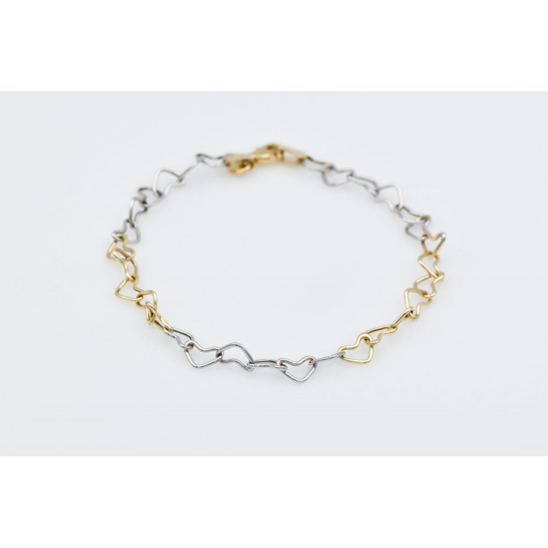 Gold bracelet with gold and whitegold K14 hearts 89562